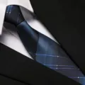 Detailed view of blue and black plaid formal business tie for office work and professional events. - 8cm New 027 Zipper
