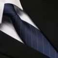Close-up detail view of the classic navy blue striped necktie featuring fine white lines. - 8cm Elegant Blue Stripe Zipper