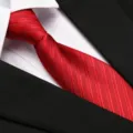 Classic red striped silk tie paired with white shirt and black suit for men business wear. - 8cm Burgundy Jacquard Pattern Zipper