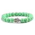 Bracelet de perles turquoise verte avec pendentif main de Hamsa argentée variante yoga. - Main Argentée Turquoise Pomme