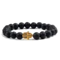 Bracelet de perles en pierre de lave noire avec charm main de hamsa dore pour yoga - Main Dorée Pierre de Lave