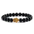 Bracelet de perles noires avec charm main de hamsa or bijoux spirituels yoga élégant - Main Dorée Pierre Noire Brillante