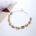 Collana girocollo intrecciata con conchiglie di cauri dorate per spiaggia regolabile - Corda Beige Conchiglia Oro