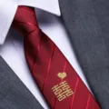 Close-up detail of red wedding necktie with gold embroidered double happiness and heart. - 8cm Joyful Plum Blossom Gold Zipper