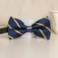 Men's blue bow tie with gold diagonal stripes, perfect for wedding groomsmen and formal events. - Navy Yellow Stripe Bowtie
