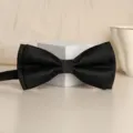 Classic black bow tie for men, elegant solid color design, perfect for weddings and formal. - Black Glossy Bowtie
