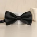 Black satin bow tie for men, classic solid color wedding groom formal necktie accessory. - Classic Black Bowtie