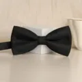 Classic black textured bow tie for men and women, elegant formal accessory for wedding suits. - Gentleman Black Bowtie