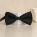 Black solid men's bow tie for formal wedding dress shirt and business events accessory. - Black Snowflake Bowtie
