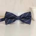 Men's dark blue diagonal striped bow tie, classic gentlemen accessory for weddings and formal wear. - Diamond Blue Stripe Bowtie