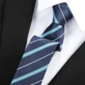 Detailed view of classic striped men's necktie in navy blue with elegant diagonal lines. - Blue Stripe Zipper / 6 cm Wide / Blue
