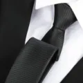 Close-up detail of mens formal black business necktie, classic textured professional tie. - Fashion Classic Zipper / 6 cm Wide / Black