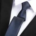 Detail view of classic navy blue striped necktie for men, professional business suit accessory. - Twill Zipper / 6 cm Wide / Sea Breeze Blue