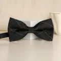 Black and white grid pattern men's formal bow tie for wedding business attire accessory. - Black White Diamond Plaid Bowtie