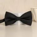 Black bow tie for men women formal wear, classic solid color wedding suit accessory variant. - Black Diagonal Plaid Bowtie