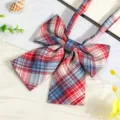 Detailed view of the Japanese JK style plaid bow tie ribbon, showcasing the fabric texture and pattern. - JK024 Rouge Blue Bow Tie