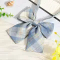 Detail view of a blue and yellow plaid JK uniform ribbon bowtie, cute sailor shirt accessory. - JK052 Ice Cream Plaid Bow Tie