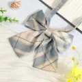 Detailed view of JK Japanese plaid bow tie neck ribbon for school uniform shirt accessories. - JK055 Lemon Sea Salt Plaid Bow Tie