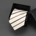 Classic striped necktie in beige and brown, neatly presented in a black gift box. - 8cm Champagne Stripe Manual