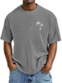 Detail view of men's casual waffle knit short sleeve t-shirt with tropical palm tree print. - S / Gray