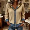 Detail view of women casual knitted denim patchwork hooded cardigan sweater with buttons. - Khaki