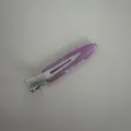 Close-up detail shot of the narrow acetate duckbill hair clip in light purple macaron color. - Shimmer Purple