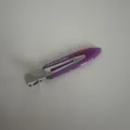 Detailed close-up shot of the purple acetate hair clip showing smooth texture and metal clip. - Purple