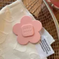 Pink flower acetate hair clip detail, featuring sweet embossed letters and elegant everyday styling. - Large Flower / Light Pink