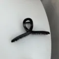 Black minimalist hair claw clip, sleek cross design for elegant daily chic hairstyles. - Black