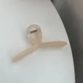 Minimalist geometric hair claw clip detail view, elegant nude tone design for daily styling. - Champagne Pink