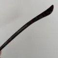 Acetate hairpin detail shot showing tortoise shell texture and handmade French craftsmanship. - Elegant Blue Brown