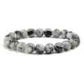 Bracciale di perle in pietra preziosa sfaccettata con cordino elastico bianco e nero - Diaspro Pelle di Leopardo