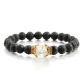 Schwarze Lavastein Perlenarmband mit goldener Krone Kristall Mitte elastischer Schmuck - Weiß
