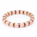 Braccialetto di perle in quarzo rosa dolce con distanziatori in strass, gioiello elegante. - Castone Dorato Strass Giallo Fumé