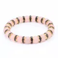 Dolce braccialetto di perline di cristallo di quarzo rosa con distanziatori di strass - Castone Dorato Strass Violetto