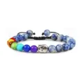Chakra stone and blue bead bracelet with silver alloy Buddha head and adjustable braided cord. - Blue Spot Stone