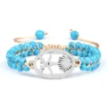 Bracelet en perles turquoise tressées avec pendentif en métal palmier et épées réglable. - Turquoise