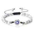 Bracelet de perles mauvais oeil avec perles en marbre blanc et pendentif strass brillant. - Howlite à Lignes Noires