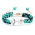 Bracelet tressé réglable en perles de turquoise avec un charm emblème argenté stylisé - Turquoise Matrix