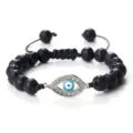 Bracelet de perles en pierre de lave noire avec breloque œil maléfique et cordon. - Noir Lave (Mauvais Oeil Argenté)