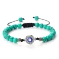 Bracelet perles turquoise mauvais œil, pendentif strass argenté, cordon tressé noir réglable. - Turquoise