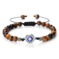 Bracelet de perles mauvais œil avec pierres d'œil de tigre et pendentif en cristal. - Œil de tigre