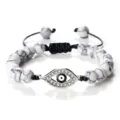 Bracelet tressé en perles de pierre blanche mauvais œil avec charm en métal strass réglable - Pierre à Veine Noire Argent