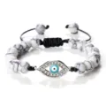 Bracelet de Perles en Howlite Blanche avec Pendentif Œil Maléfique et Cordon Réglable - Turquoise Blanche (Mauvais Oeil Argenté)