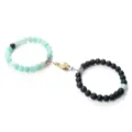 Couple magnetic hand bracelets set featuring green cracked agate and matte black beaded designs. - Matte Weathered Green Stone