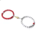 Magnetic couple bracelets with red and white stone beads and gold silver handshake clasp. - Veined Turquoise Red Turquoise