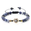 Bracelet de perles œil turc avec pierres de sodalite bleue et cordon noir réglable. - Sodalite