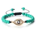 Bracelet tressé en perles turquoise mauvais œil avec pendentif en cristal strass réglable. - Turquoise - Or