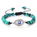 Bracelet de perles turquoises avec œil grec et cordon noir réglable, style bohème. - Turquoise du Xinjiang Argent