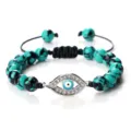 Bracelet tressé de perles œil turquoise avec charm en zircone cubique pour mode quotidienne. - Turquoise du Xinjiang (Mauvais Oeil Argenté)